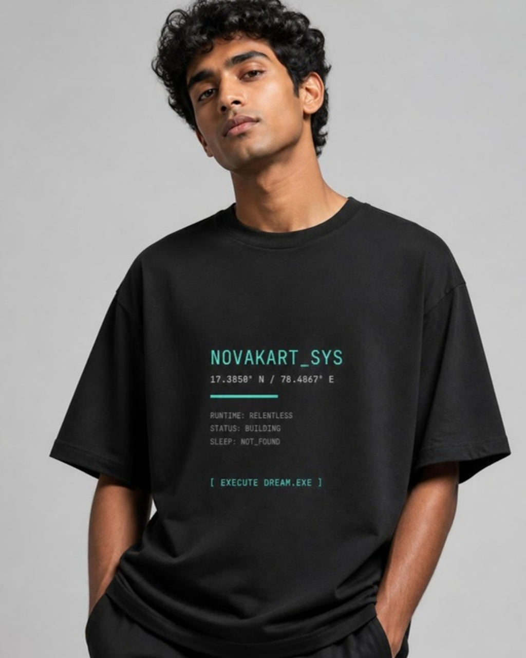 NOVAKART_SYS oversized tee on male model
