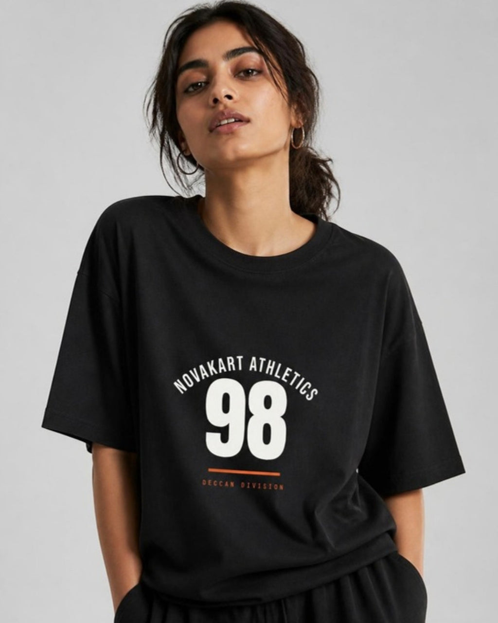NovaKart Athletics 98 oversized tee on female model
